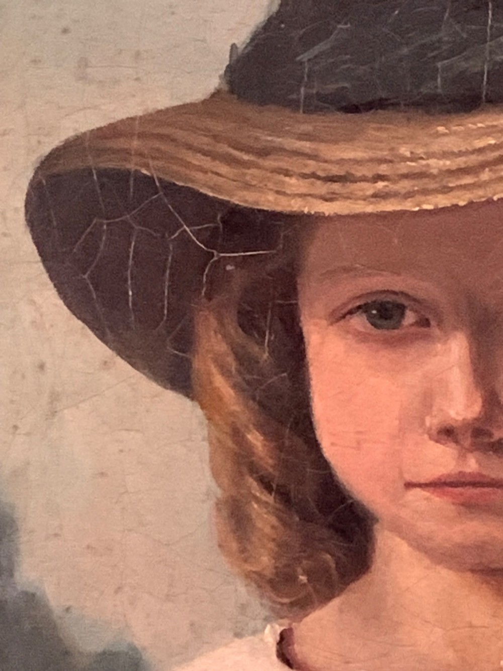 An early 19th-century oil portrait depicting a young girl in a white puff-sleeved dress and bonnet holding a book. View VIII