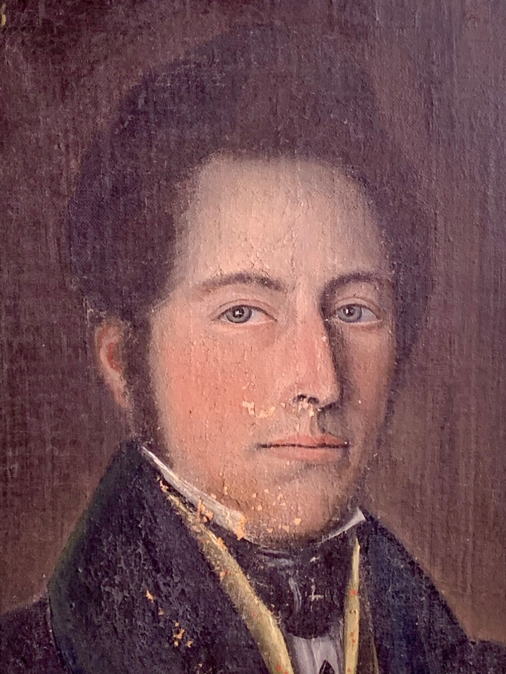 A 19th-century oil portrait on canvas depicting a gentleman with blue eyes, dark hair, a yellow waistcoat, and a dark blue coat. View III