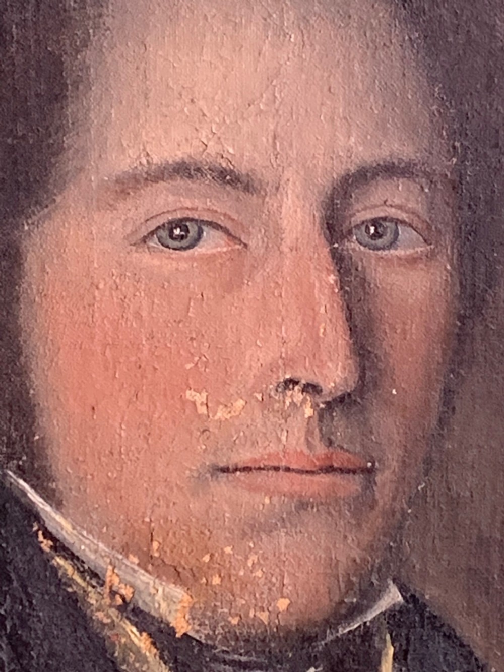 A 19th-century oil portrait on canvas depicting a gentleman with blue eyes, dark hair, a yellow waistcoat, and a dark blue coat. View IV