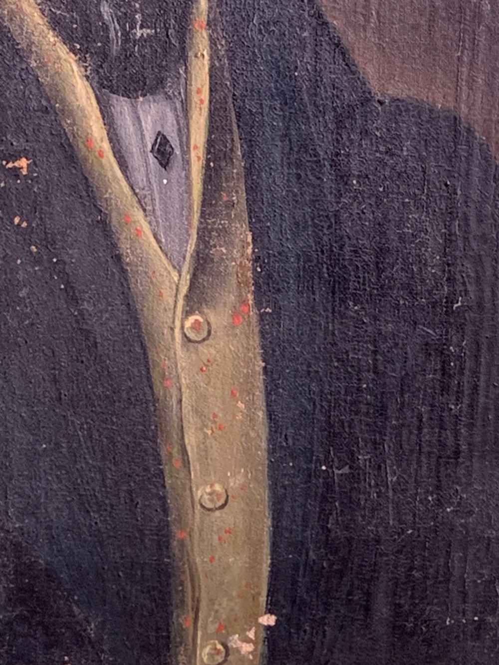 A 19th-century oil portrait on canvas depicting a gentleman with blue eyes, dark hair, a yellow waistcoat, and a dark blue coat. View VI