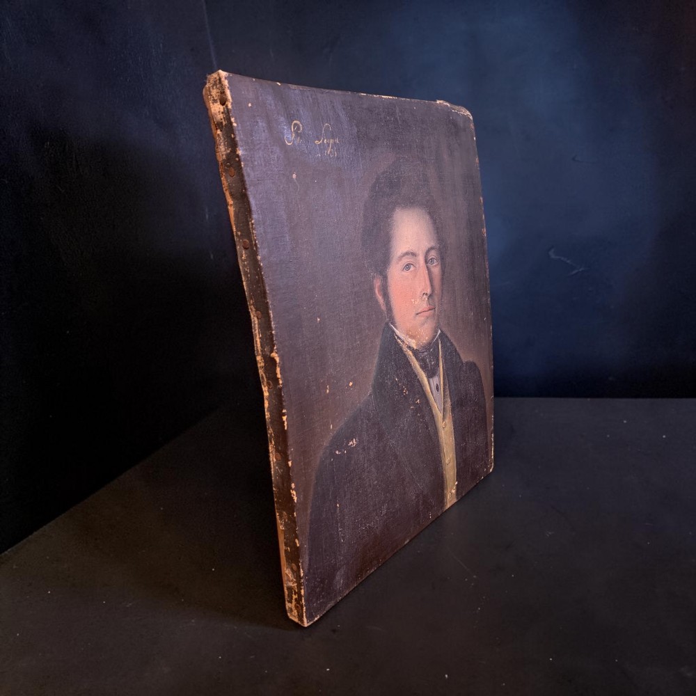 A 19th-century oil portrait on canvas depicting a gentleman with blue eyes, dark hair, a yellow waistcoat, and a dark blue coat. View IX