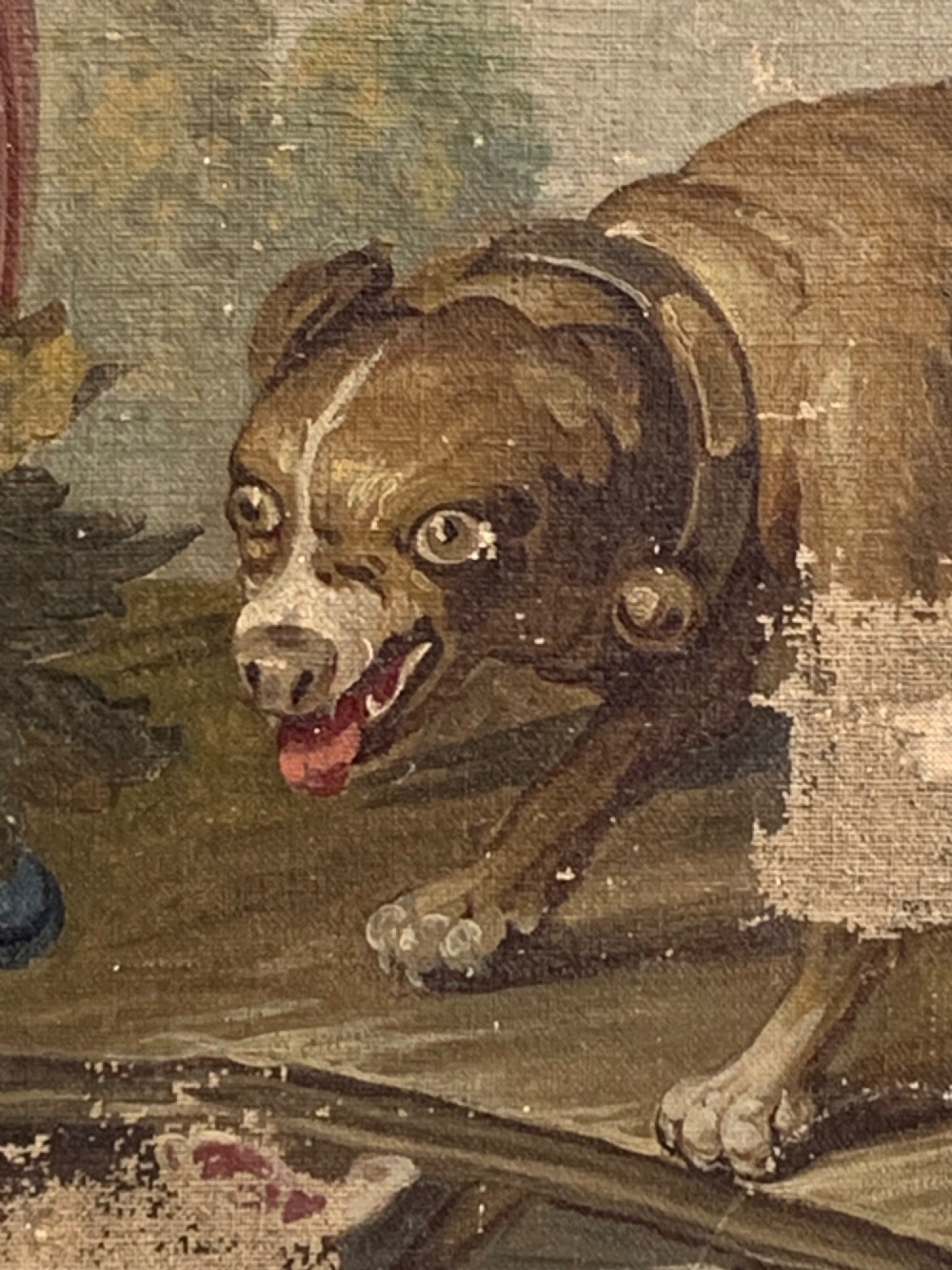 An early 19th-century oil painting on canvas featuring a brown dog framed by a floral cartouche against a muted sage green background. View VI