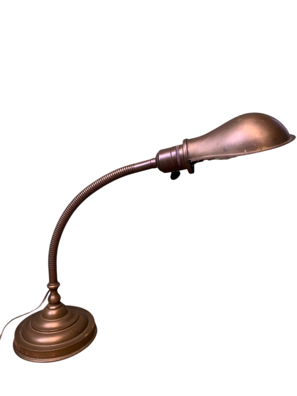 An antique French desk lamp crafted from patinated brass, featuring a weighted circular base, a flexible gooseneck stem, and an adjustable brass shade. View II