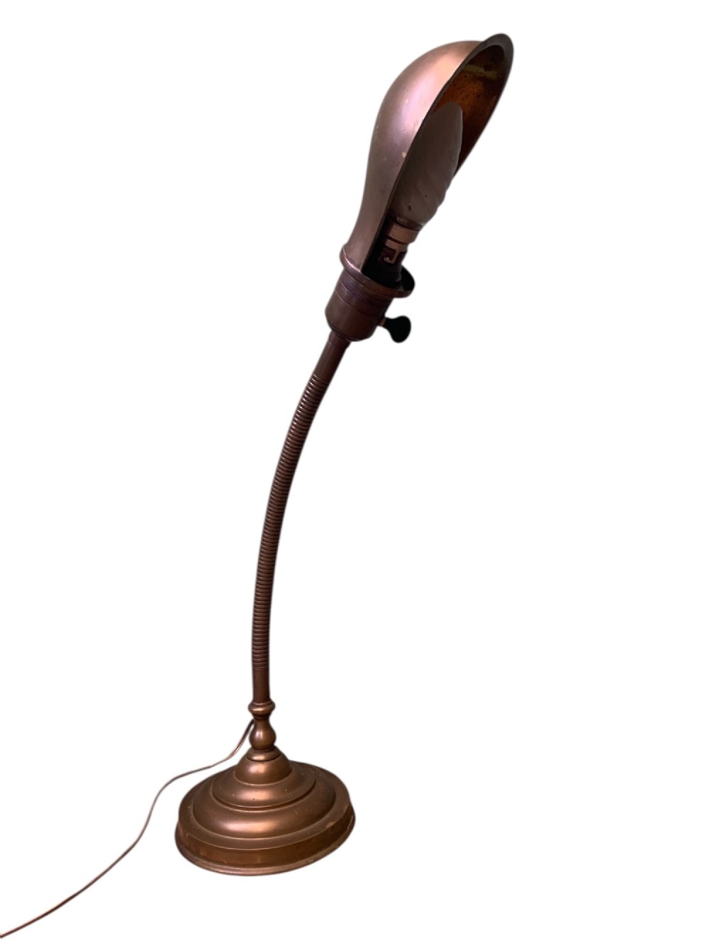 An antique French desk lamp crafted from patinated brass, featuring a weighted circular base, a flexible gooseneck stem, and an adjustable brass shade. View IV