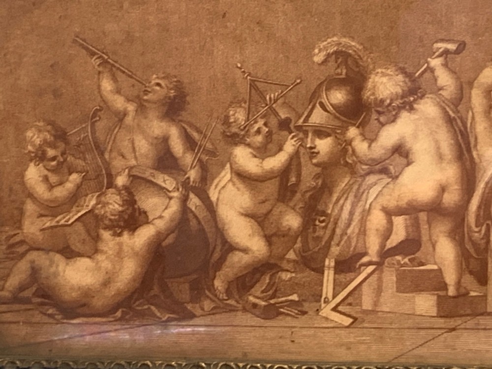 A horizontal monochrome 18th-century style framed engraving depicting classical putti engaged in artistic and architectural pursuits. View VII