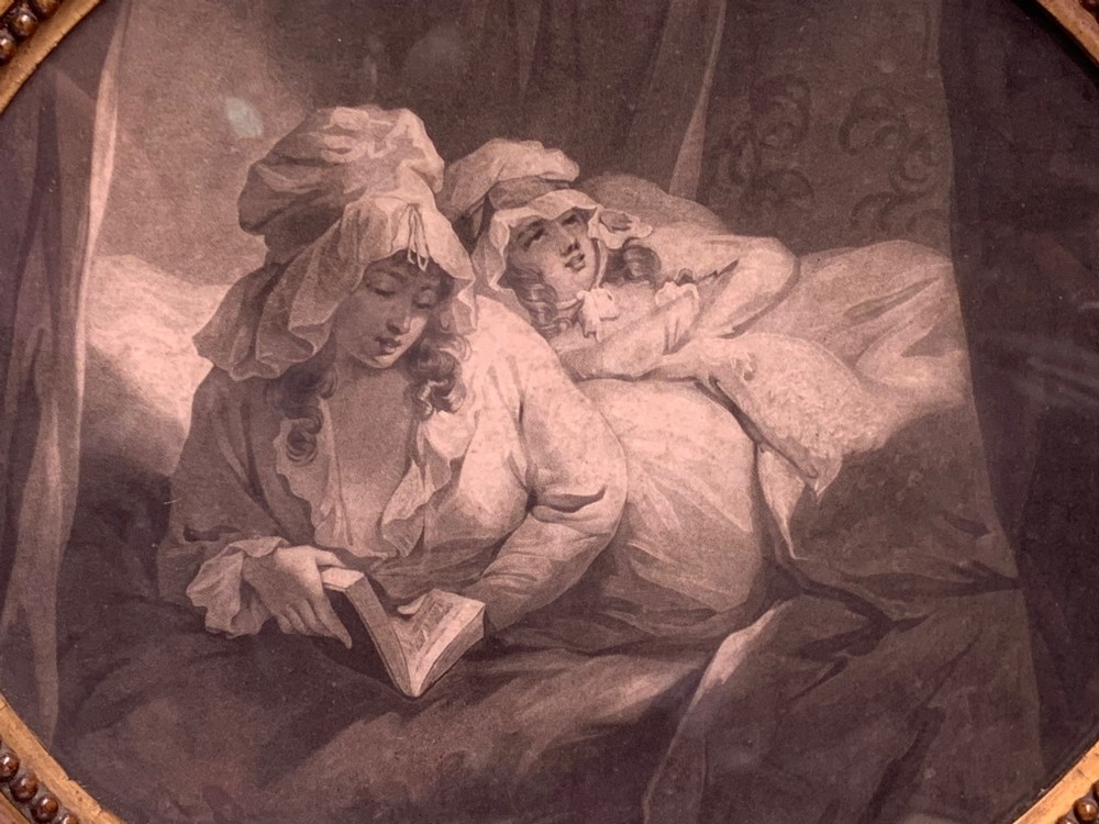 An oval 18th-century sepia print displaying a domestic bedroom scene, enclosed within a carved circular giltwood frame with beaded detailing. View IV