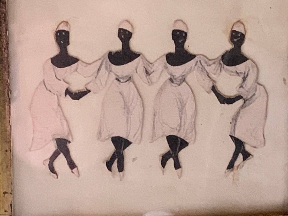 A 19th-century framed paper collage displaying four dancing female figures holding hands within a moulded timber frame and gilded inner slip. View V