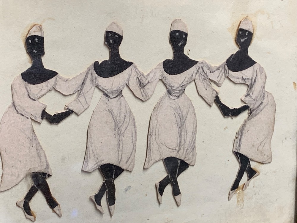 A 19th-century framed paper collage displaying four dancing female figures holding hands within a moulded timber frame and gilded inner slip. View VI