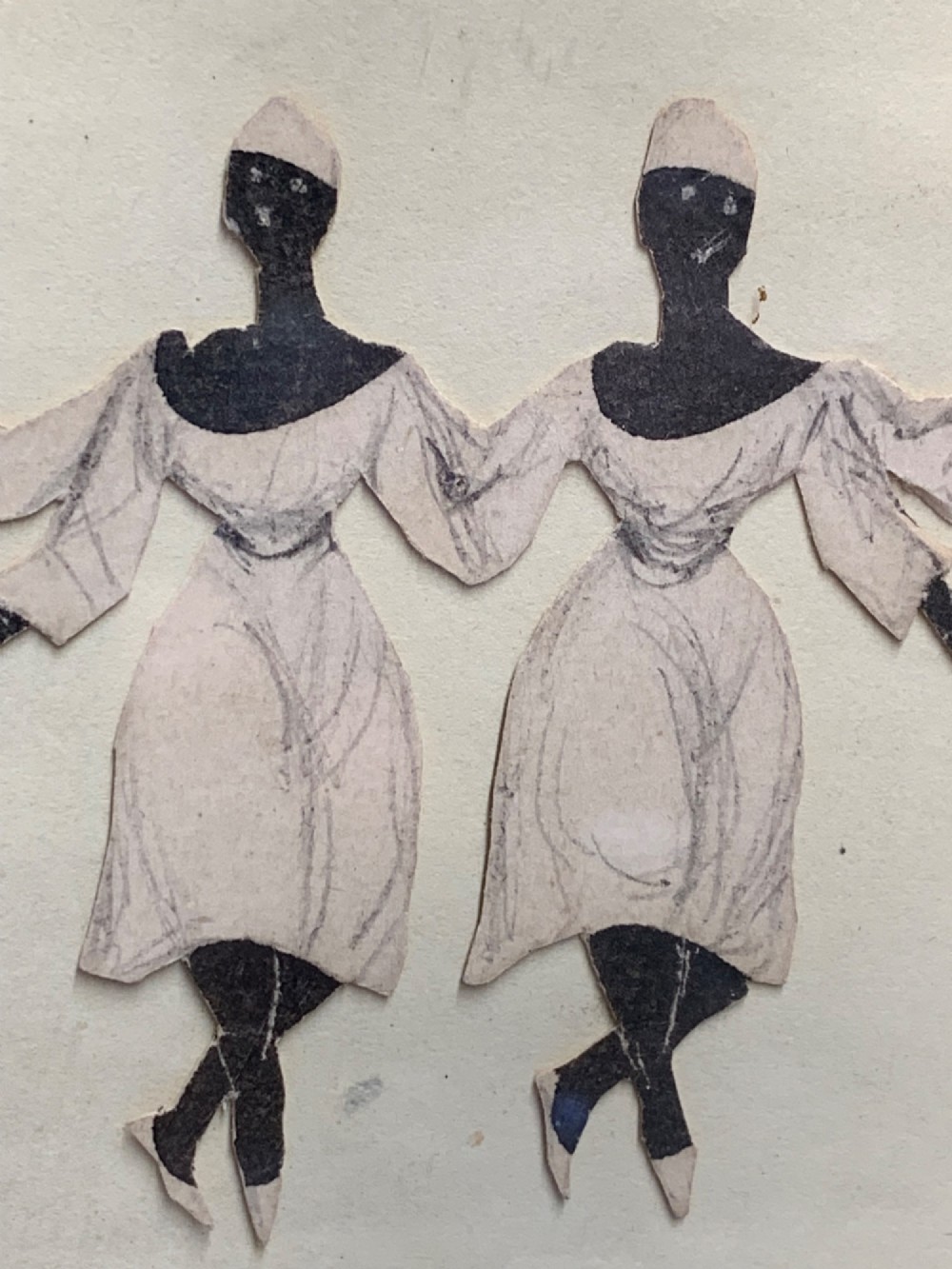 A 19th-century framed paper collage displaying four dancing female figures holding hands within a moulded timber frame and gilded inner slip. View VII