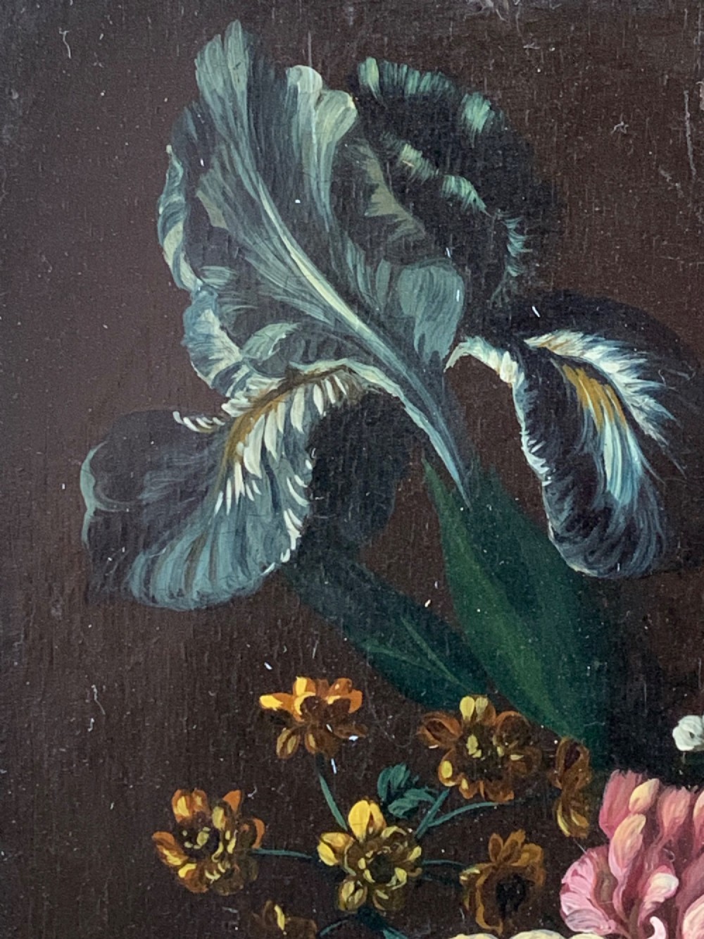A framed Dutch School style oil painting on wood panel featuring a varied arrangement of flowers in a fluted urn set against a dark background. View XI