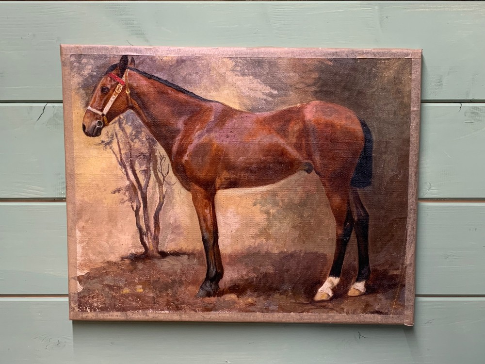 An early 20th-century oil painting on canvas depicting a profile view of a brown thoroughbred horse standing in a landscape. View II