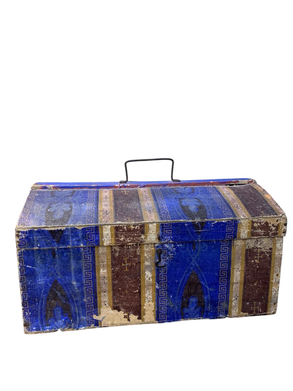 An 18th-century domed-top wooden dowry box covered in patterned blue and brown block-printed paper with iron hardware. View II