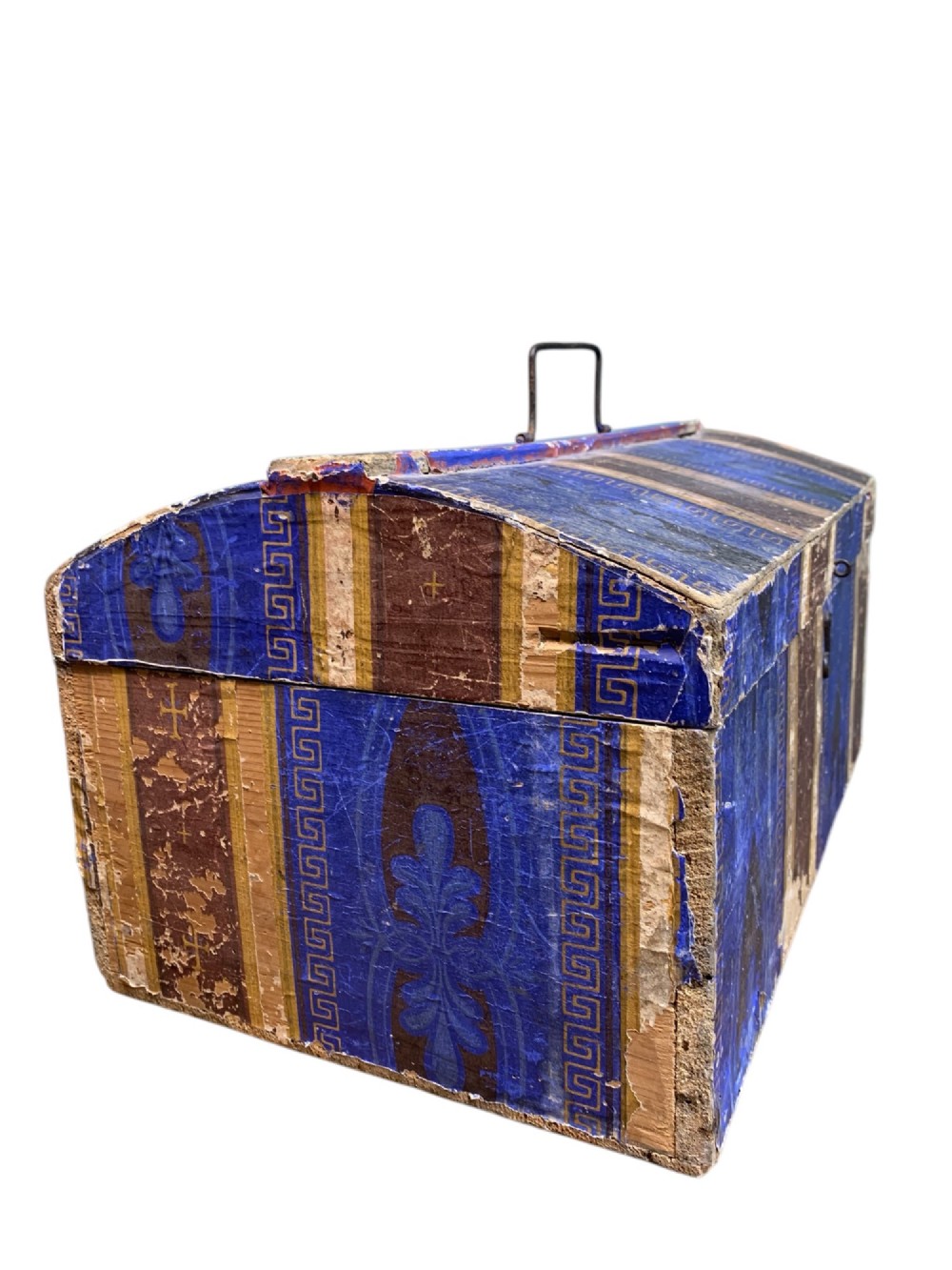An 18th-century domed-top wooden dowry box covered in patterned blue and brown block-printed paper with iron hardware. View IV