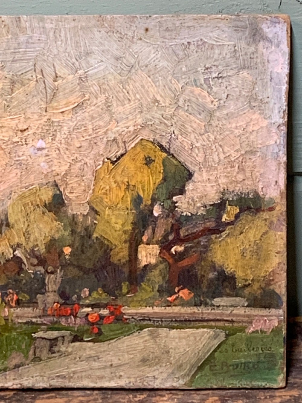 An impressionist oil painting on wooden board depicting the Tuileries Garden in Paris with visible impasto brushstrokes in muted green, ochre, and grey tones. View VI