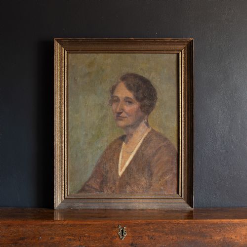 fig 1. Early 20th-Century Portrait Of A Woman In A Brown Top