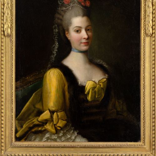 fig 5. An eighteenth-century French oil painting on canvas depicting a lady with powdered hair and a yellow dress, housed in a carved gold leaf frame.