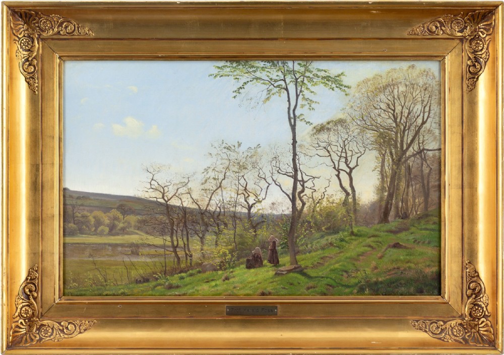 A nineteenth-century Danish landscape oil painting depicting bare spring trees and green hills in Jutland, framed in an ornate gilded picture frame.