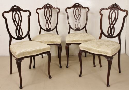 Set of Four Chairs by Jas. Shoolbred and Co.