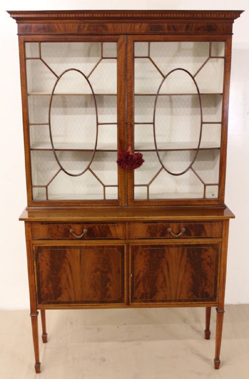 fig 5. Inlaid Mahogany Display Cabinet by Waring and Gillow
