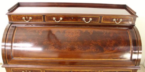fig 1. Inlaid Mahogany Cylinder Bureau by Maple and Co