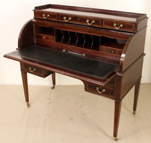 fig 2. Inlaid Mahogany Cylinder Bureau by Maple and Co