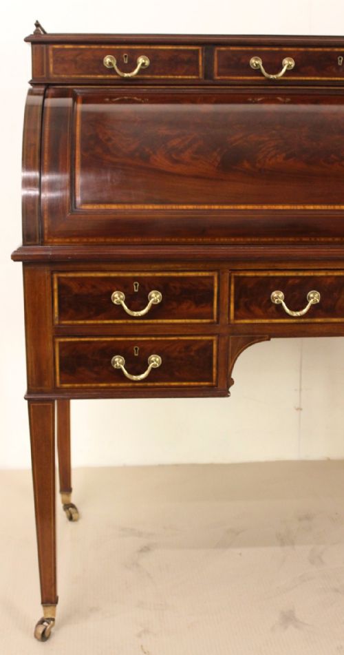 fig 5. Inlaid Mahogany Cylinder Bureau by Maple and Co