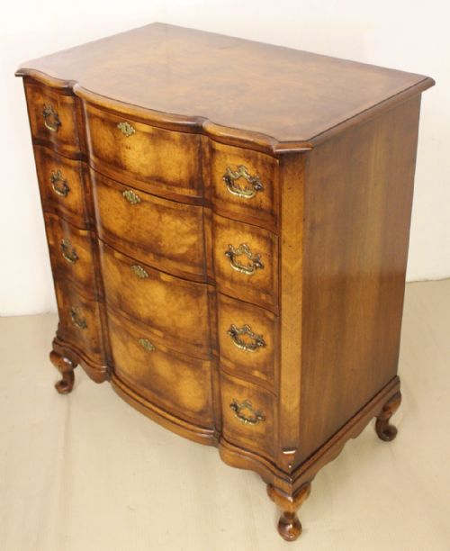 fig 3. Burr Walnut Serpentine fronted Chest by Waring and Gillow