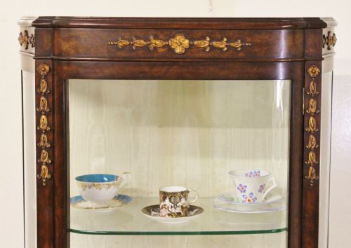 fig 1. Burr Walnut Vitrine by Maple and Co