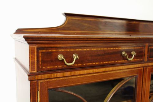 fig 1. Inlaid Mahogany Bookcase by Maple and Co