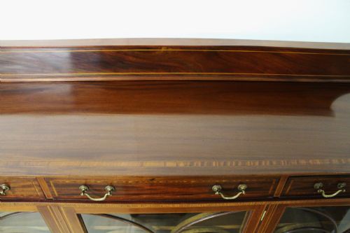 fig 2. Inlaid Mahogany Bookcase by Maple and Co