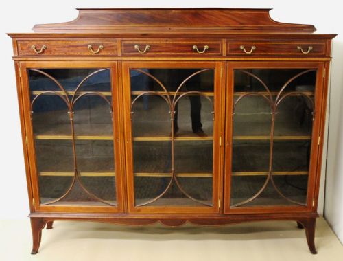 fig 4. Inlaid Mahogany Bookcase by Maple and Co