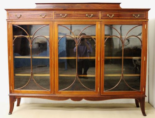 fig 5. Inlaid Mahogany Bookcase by Maple and Co