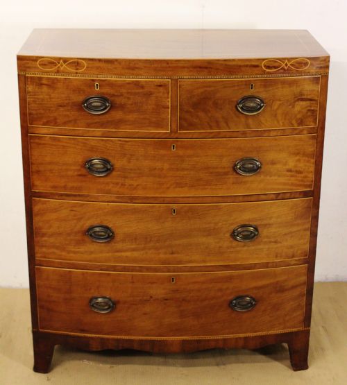fig 1. Maple and Co Inlaid Bow Fronted Chest of Drawers