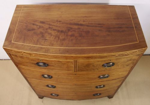 fig 2. Maple and Co Inlaid Bow Fronted Chest of Drawers