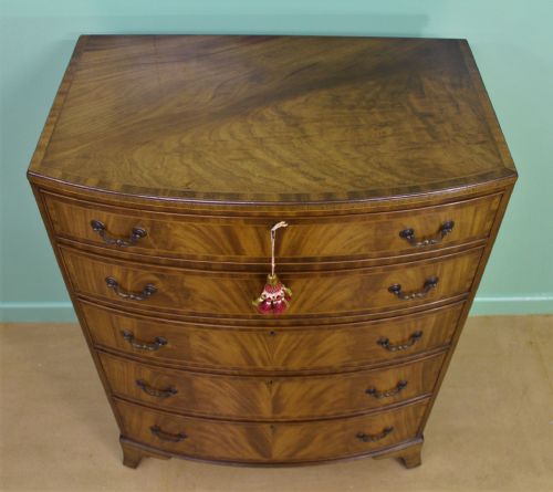 fig 1. Waring and Gillow Inlaid Mahogany Bow Fronted Chest of Drawers