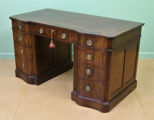 fig 3. Serpentine Fronted Pedestal Desk by Waring and Gillow