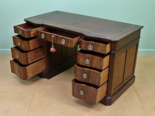 fig 4. Serpentine Fronted Pedestal Desk by Waring and Gillow