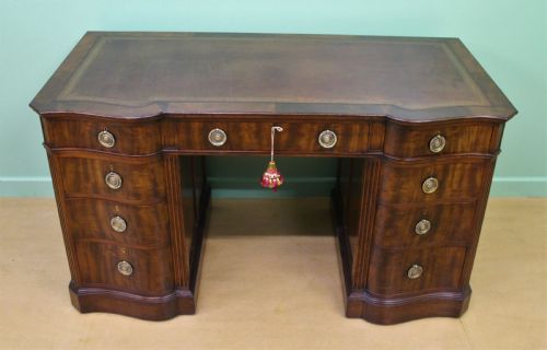 fig 5. Serpentine Fronted Pedestal Desk by Waring and Gillow