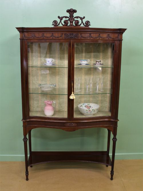 Serpentine Mahogany Display Cabinet by Maple and Co