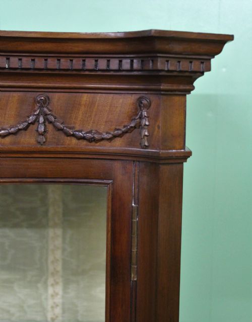 fig 2. Serpentine Mahogany Display Cabinet by Maple and Co