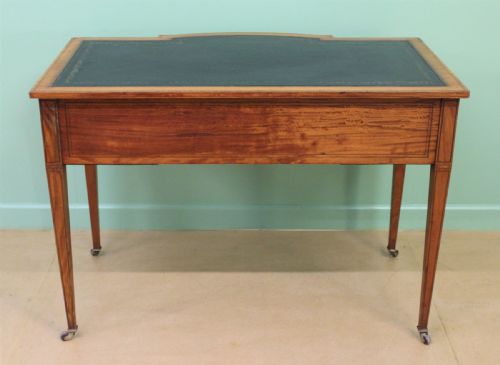 fig 4. Inlaid Satinwood Writing Table by Maple and Co.