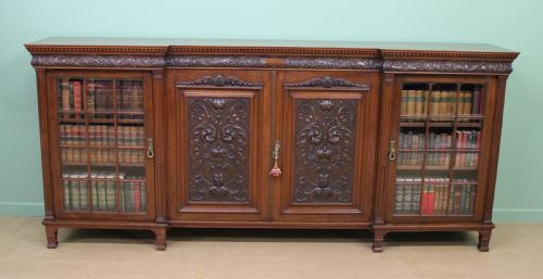 Long Victorian Carved Walnut Bookcase by Maple and Co.