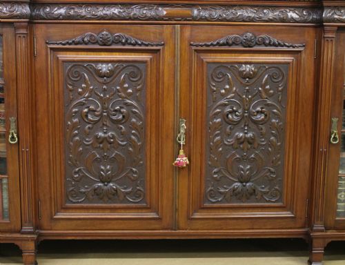 fig 2. Long Victorian Carved Walnut Bookcase by Maple and Co. 