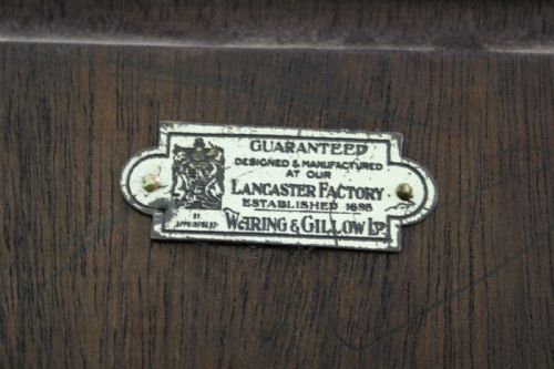 fig 4. Waring and Gillow Burr Walnut Breakfront Bookcase
