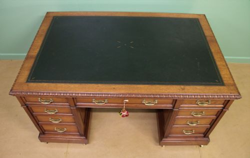 fig 2. Walnut Partners Pedestal Desk by Maple & Co.