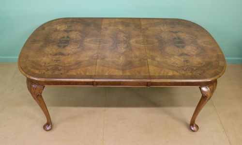 fig 4. Burr Walnut Dining Suite by Maple and Co