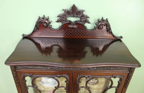 fig 2. Maple and Co Carved Mahogany Display Cabinet