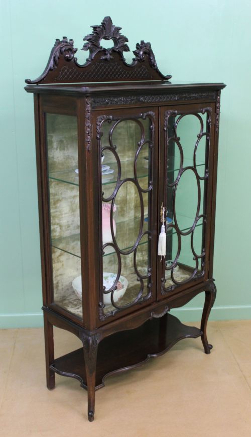 fig 3. Maple and Co Carved Mahogany Display Cabinet
