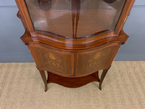 fig 1. Edwards and Roberts Serpentine Display Cabinet