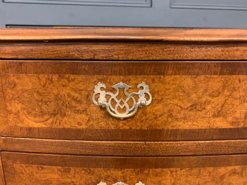 fig 2. Bow Fronted Burr Walnut Chest by Maple and Co